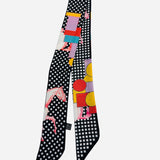 Black twilly scarf with colorful horse illustrations and geometric prints.