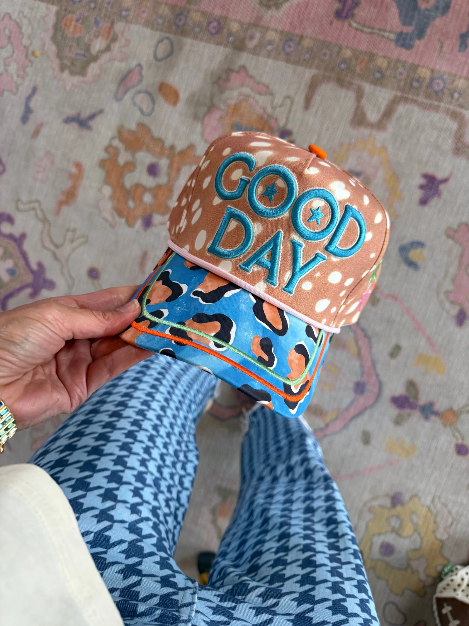 Spotted Good Day hat with bold embroidery and blue leopard print bill.