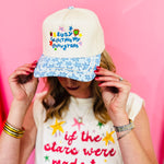 Off-white hat with lucky stars embroidery, strawberry accents, and blue star-print bill.