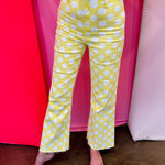 Yellow white polka dot pattern, high-waist design, and stretchy denim fabric for a flattering, comfortable fit.