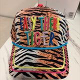 Animal print Easy There Tiger hat with colorful embroidery and bright blue rope trim.