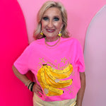 Hot pink tee with banana graphic, neon stars, and Gone Bananas lettering.