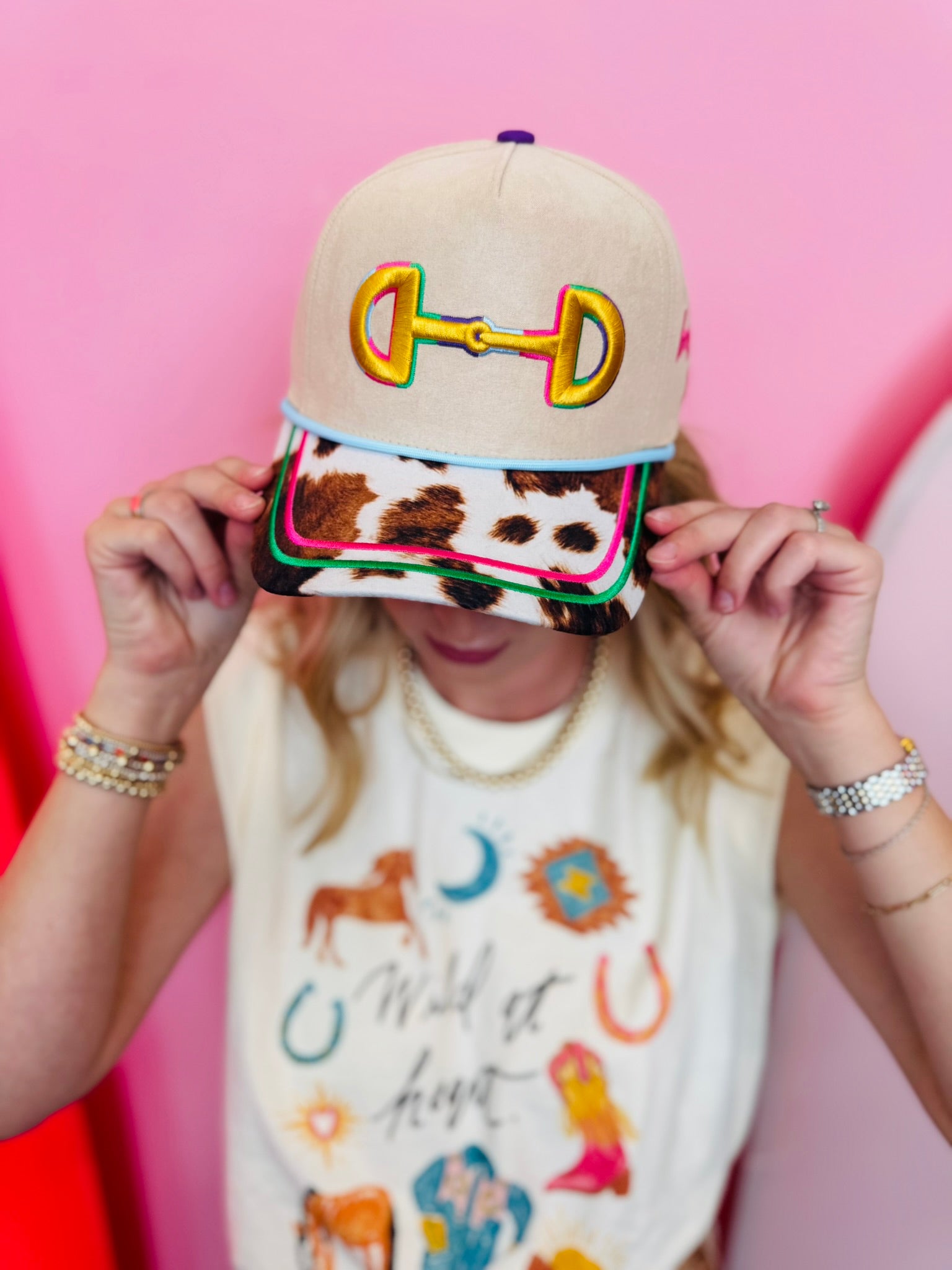 Canvas horse bit hat with yellow embroidery, horse-print bill, and colorful stars.