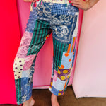 Colorful Poppy & Pine patchwork wide leg pants with lace pocket detail.