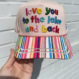 Colorful lake-themed hat with striped bill, star details, and Love You To The Lake & Back embroidery.