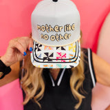 Canvas Mother Like No Other hat with quilted bill and embroidered design.