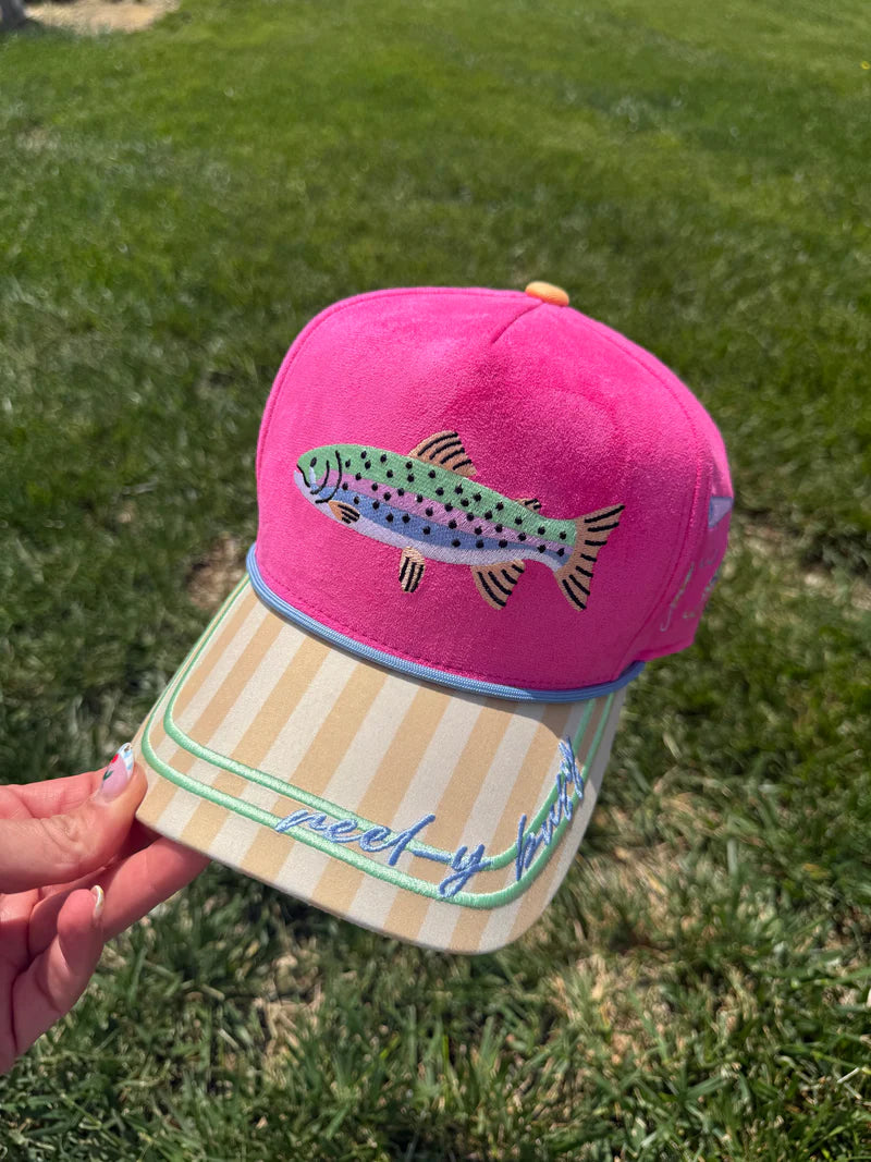 Pink faux suede hat with fish embroidery, striped bill, and Reel-y Busy detail.