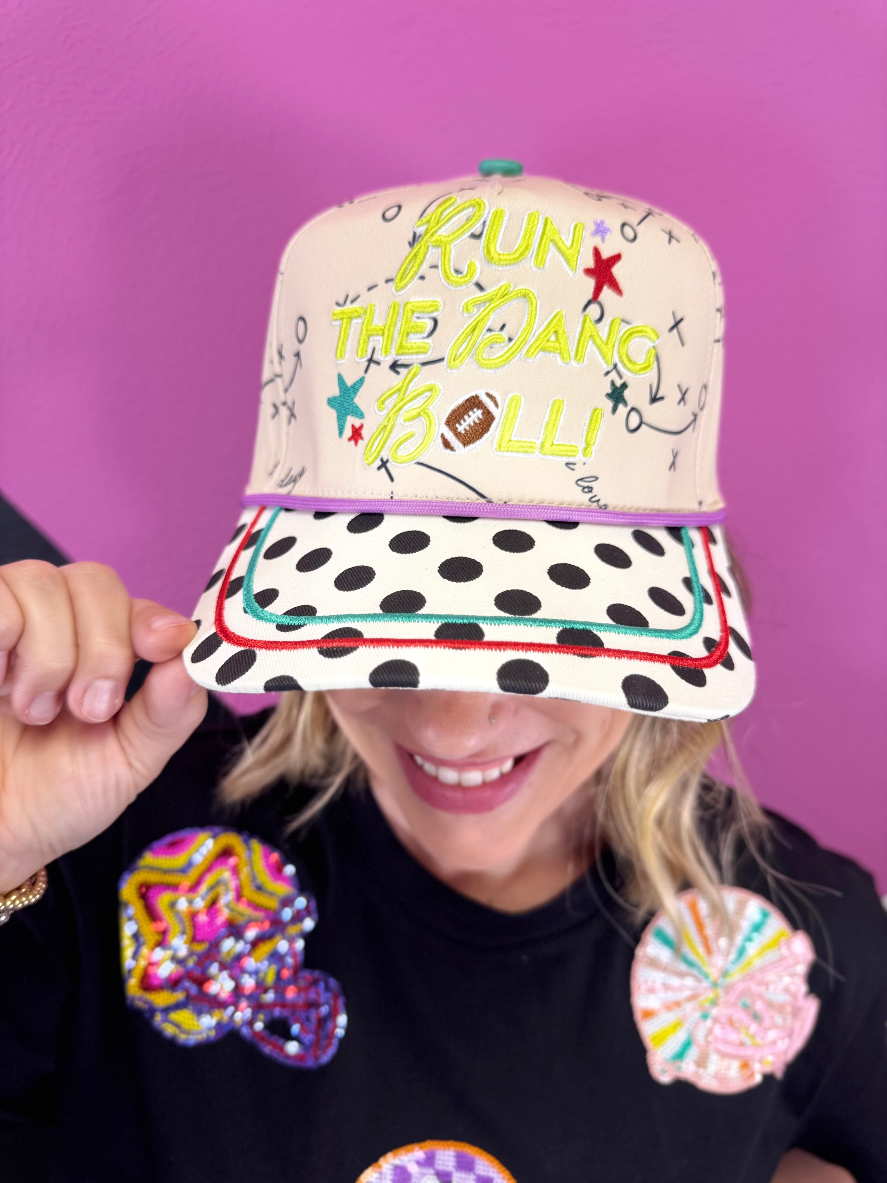 Game day hat with Run The Dang Ball embroidery, football details, and polka dot brim.