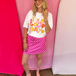 Retro softball graphic tee with colorful lettering and bright softball-themed accents.