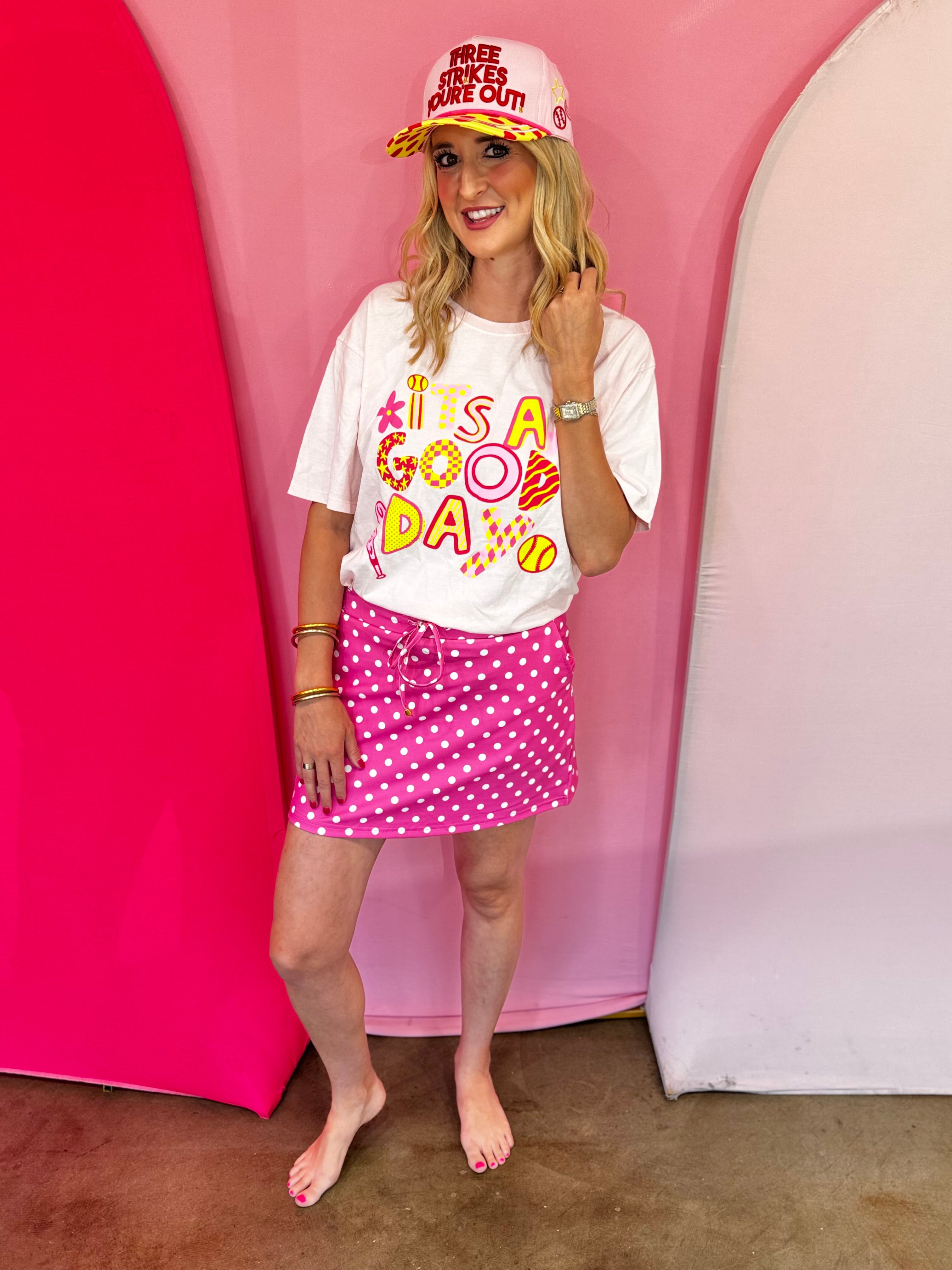 Retro softball graphic tee with colorful lettering and bright softball-themed accents.