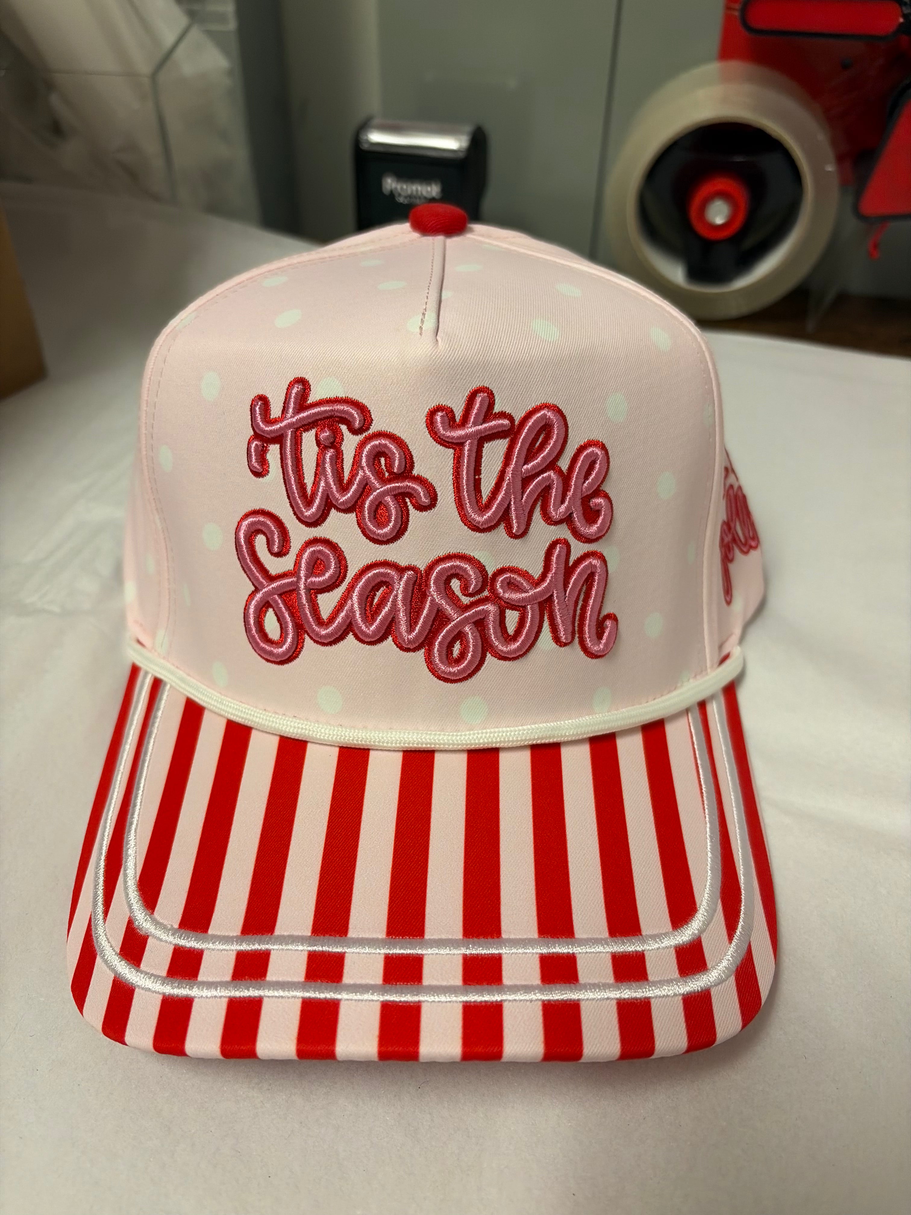Pink polka dot Christmas hat with Tis The Season embroidery and striped bill.