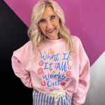 Pink sweatshirt with colorful What If It All Works Out graphic and playful icons.