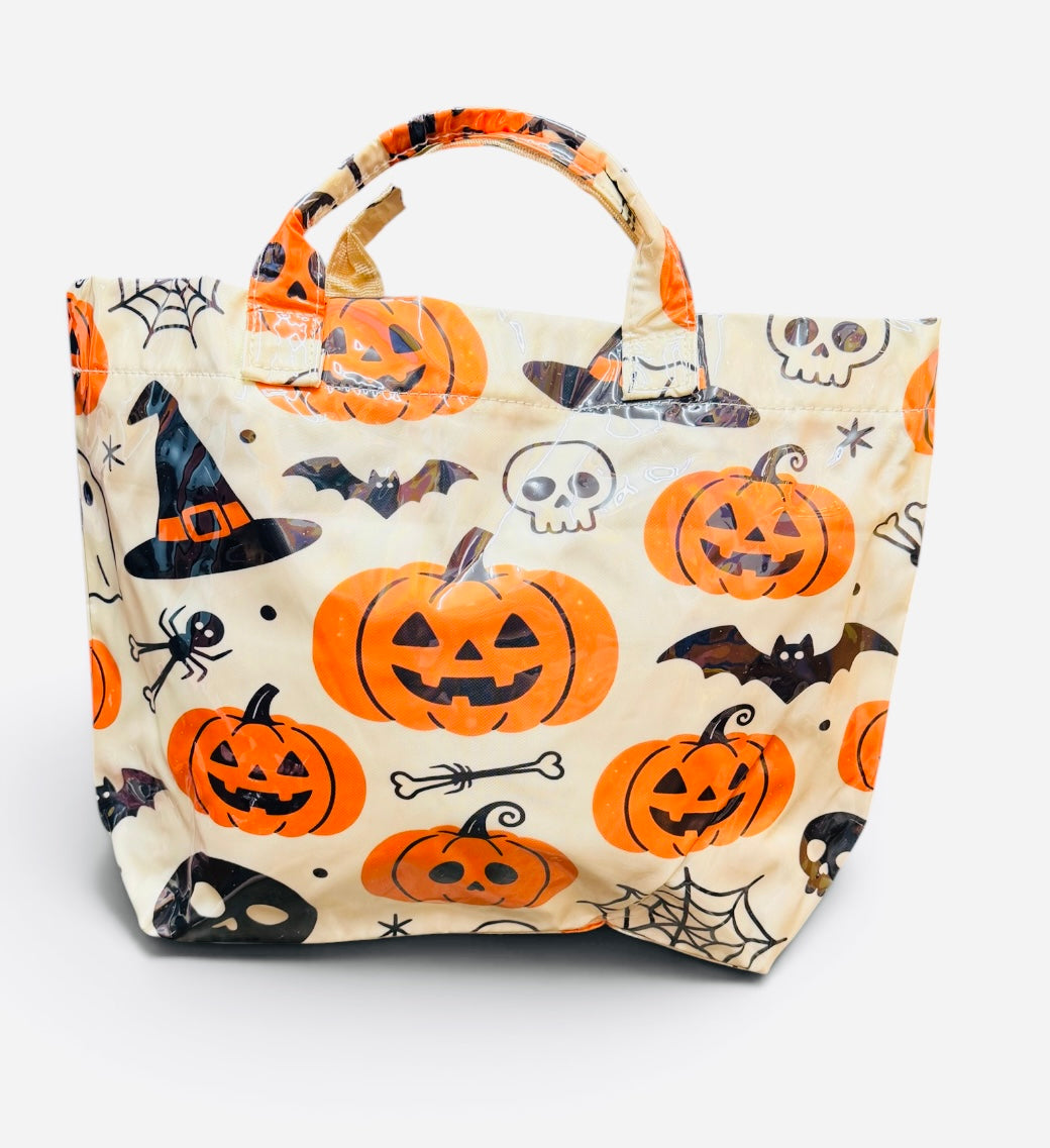 Halloween tote bag with orange jack-o'-lanterns, witch hats, bats, skulls, spiders, and spiderwebs.