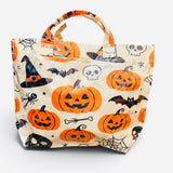 Halloween tote bag with orange jack-o'-lanterns, witch hats, bats, skulls, spiders, and spiderwebs.