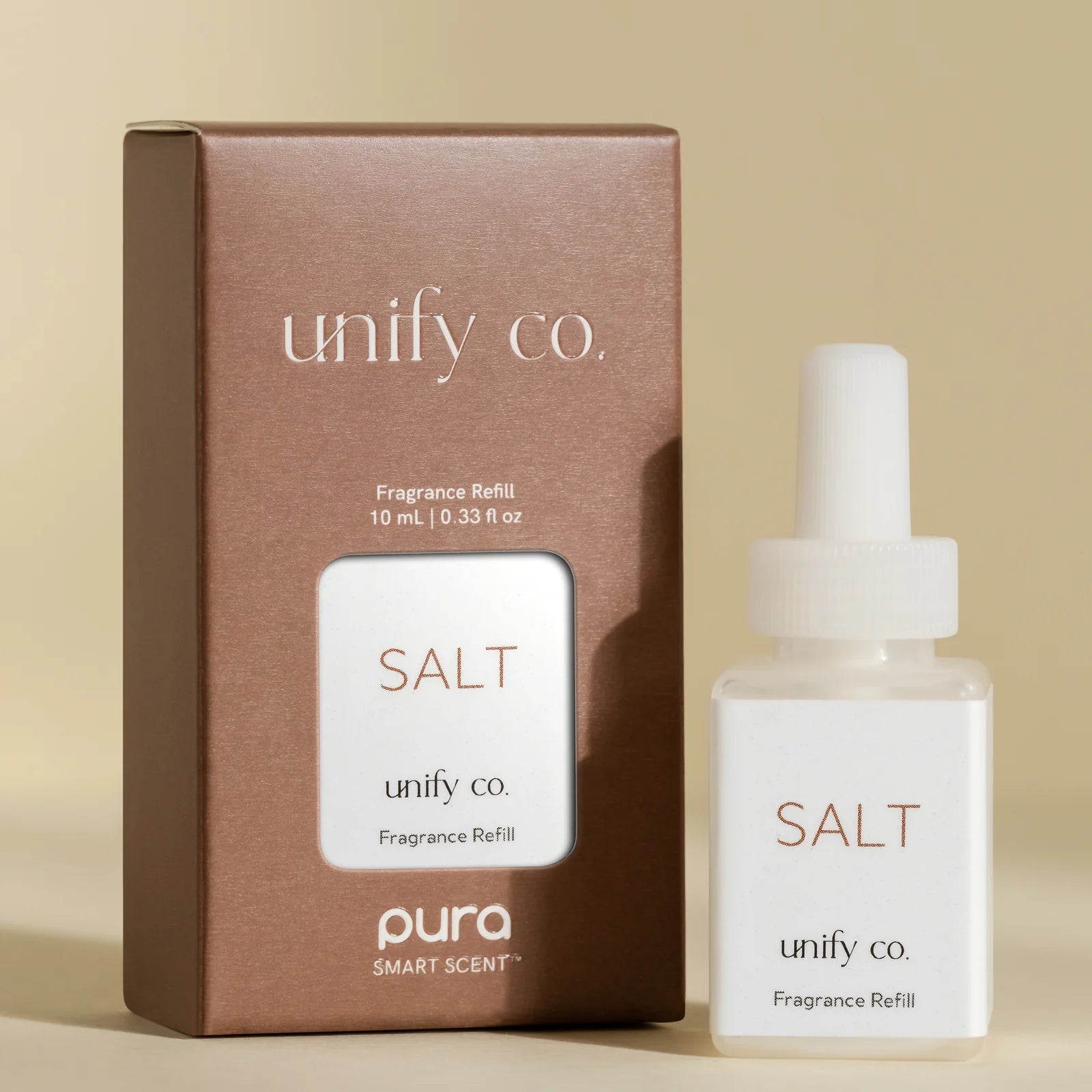 Pura Salt fragrance refill with warm citrus, clary sage, freesia, and softwood notes.