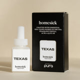 Pura Texas home fragrance refill with pine, leather, cedarwood, and musk notes.