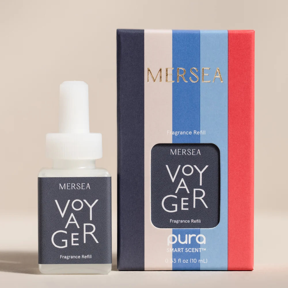 Pura Voyager fragrance refill with citrus, pepper, and moss notes.