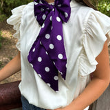 Purple and white polka dot silky scarf for neck, hair, handbag, or hat styling.