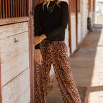 Leopard print wide-leg jogger pants made from soft stretchy fabric for bold comfortable style.
