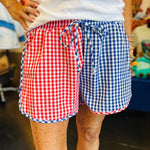 Red and blue gingham color block shorts with elastic waistband