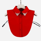 Red detachable collar with pearl and rhinestone embellishments and slim tailored fit for easy layering.
