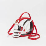 Clear football helmet crossbody bag with red accents, gold hardware, top handle, and adjustable strap.