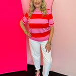 Red and pink colorblock striped knit tee with crew neckline and soft lightweight fabric