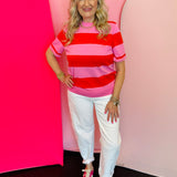 Red and pink colorblock striped knit tee with crew neckline and soft lightweight fabric