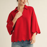 Red scalloped V-neck top with collar and 3/4 sleeves, made from soft, lightweight stretch fabric.