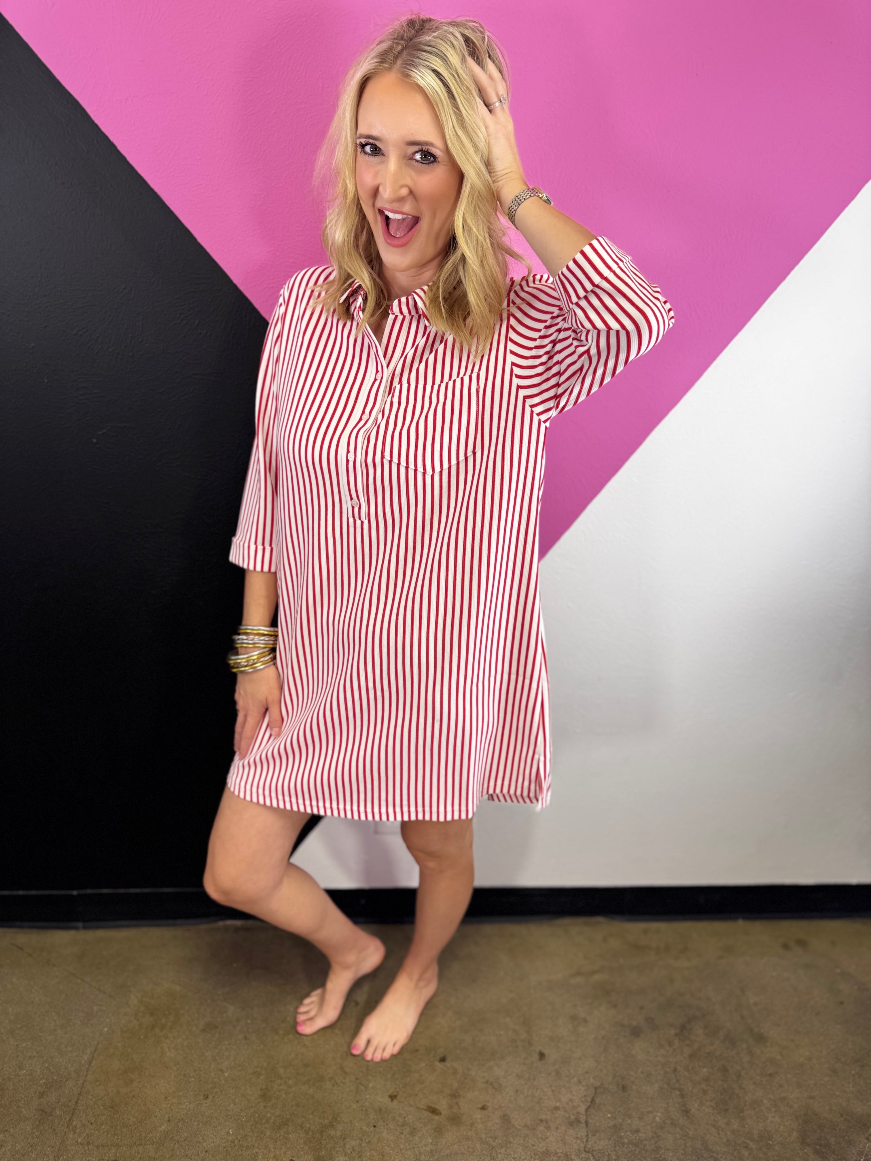 Red striped collared shirt dress with button front, chest pocket, and three-quarter sleeves