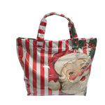 Red and white striped PVC tote bag with festive Santa Claus graphics and double handles.