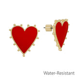 Red studded heart stud earrings measuring .75 inches with bold water resistant design