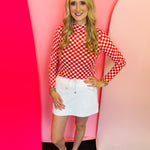 Red and white checkered mesh top designed for lightweight layering and bold, playful style.