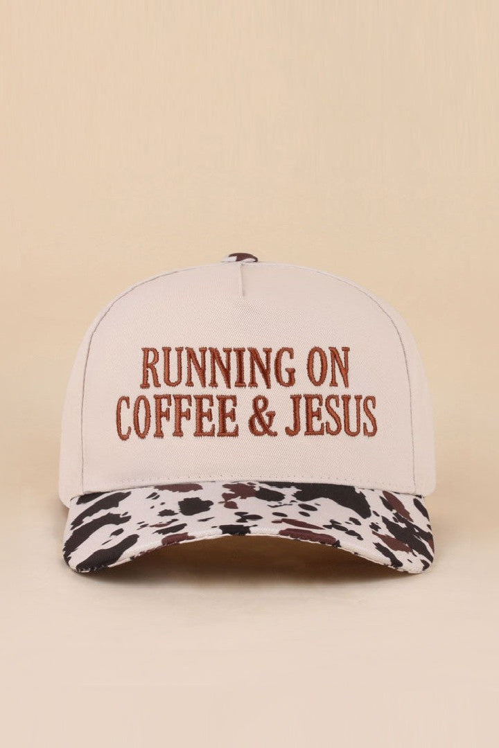 Two-tone cotton hat with Running On Coffee & Jesus embroidered detail.