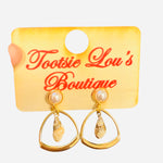 Gold hoop earrings with pearl stud and seashell charm