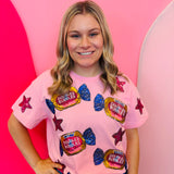 Light pink top with double bubble graphic and pink sequin star accents.