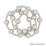 Set of three silver stretch bracelets with 14mm ball beads and 5mm beaded accents.