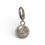 Silver sunburst scarf charm with baguette crystal center and clear stone halo