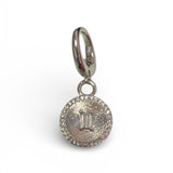 Silver sunburst scarf charm with baguette crystal center and clear stone halo