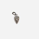 Silver vintage heart charm with crystal center, sunburst ridges, and lobster clasp