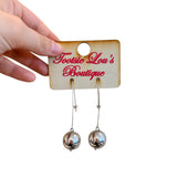 Silver Orbit Drop Earrings – silver-tone open teardrop with polished silver sphere, lightweight modern design