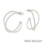 Silver twisted hoop earrings with textured design, 1.25 inch, water resistant.
