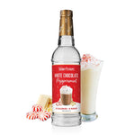 Skinny Mixes sugar free white chocolate peppermint syrup bottle with festive flavor.