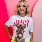 Cream tee with donkey graphic and “Smart” text, accented with neon rhinestone embellishments.