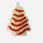 Snack cake-shaped car freshie with vanilla buttercreme scent, cute design, and hanging string for cars.