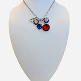 Silver necklace with red blue and clear crystal charm cluster