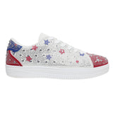 Patriotic sneakers with rhinestones and red white blue star accents.