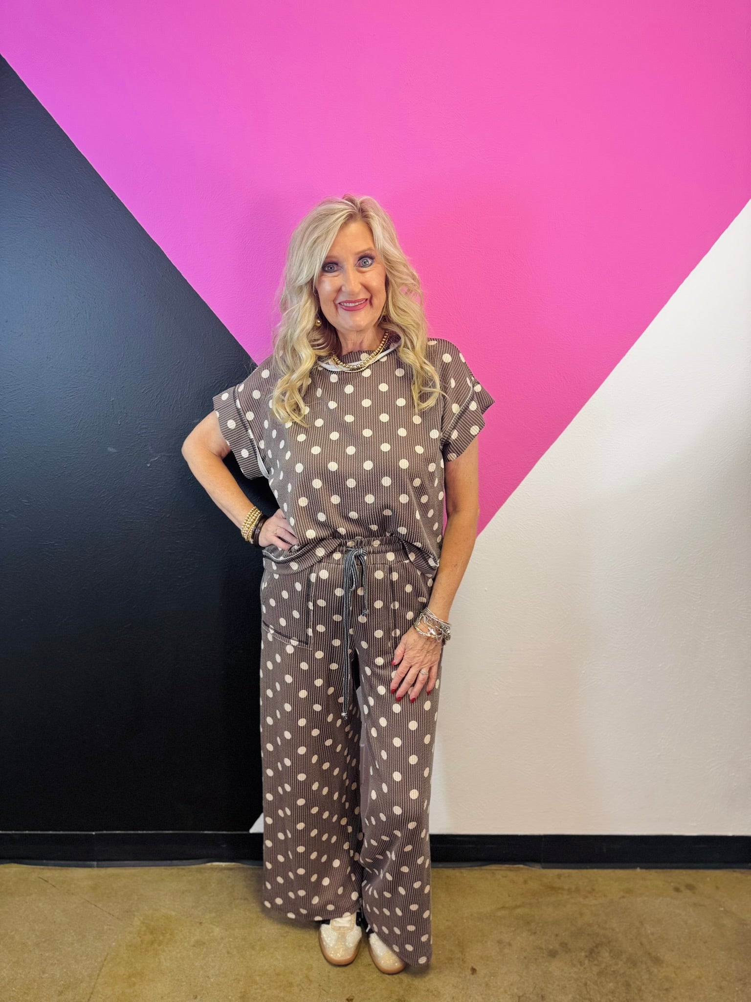 Mocha ribbed short sleeve top with cream polka dots, crew neckline, and relaxed fit.