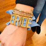 Stretchy charm bands bracelet with elastic design, stackable style, and customizable charm letter option