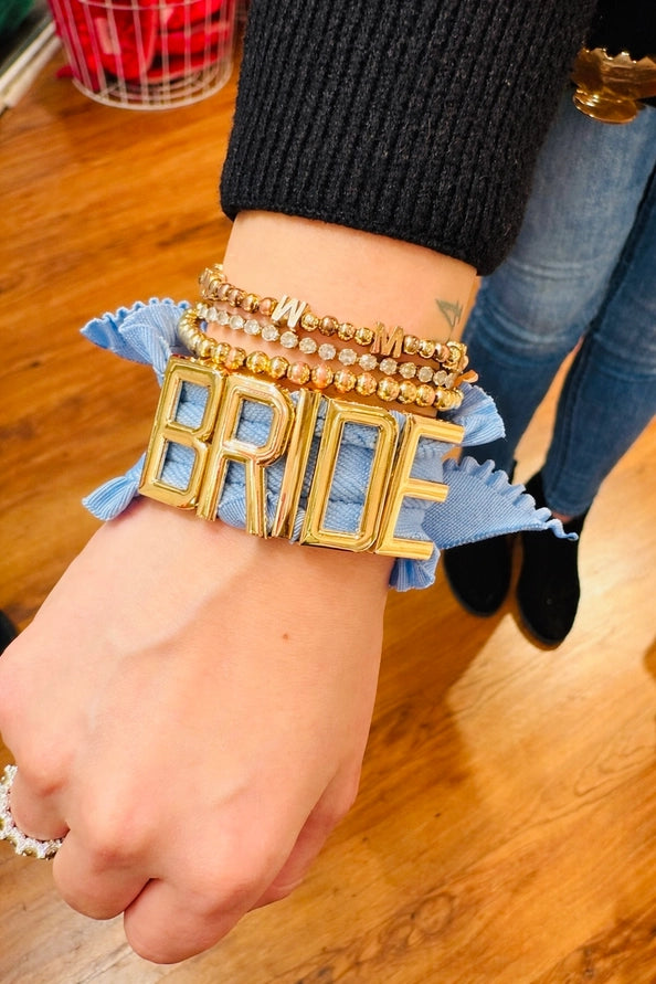 Stretchy charm bands bracelet with elastic design, stackable style, and customizable charm letter option